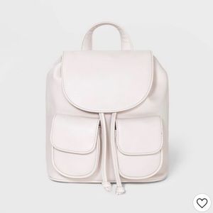 A baby pink mini bag.